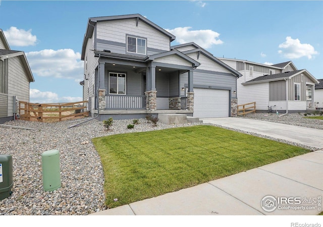 view of front of home with a porch, fence, stone siding, driveway, and a front lawn