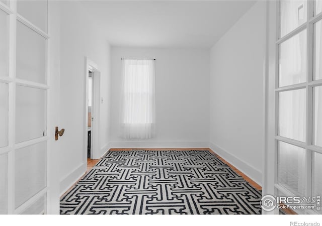 empty room featuring hardwood / wood-style floors