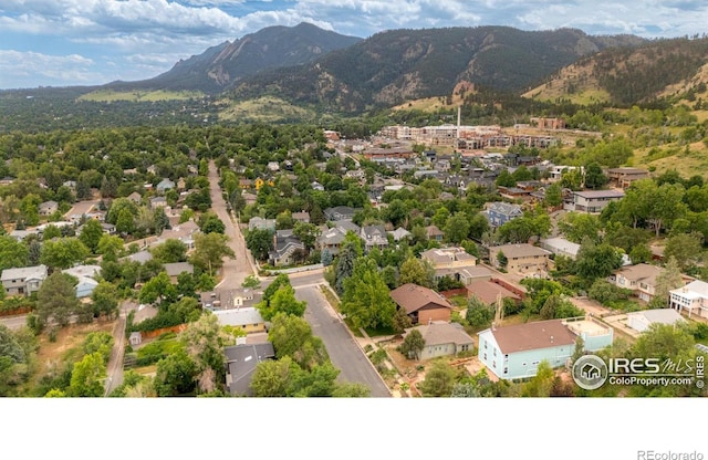 birds eye view of property featuring a mountain view