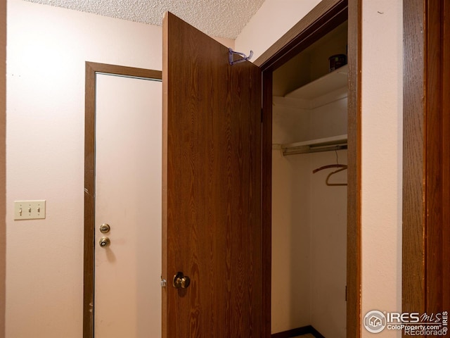 bathroom featuring a textured ceiling