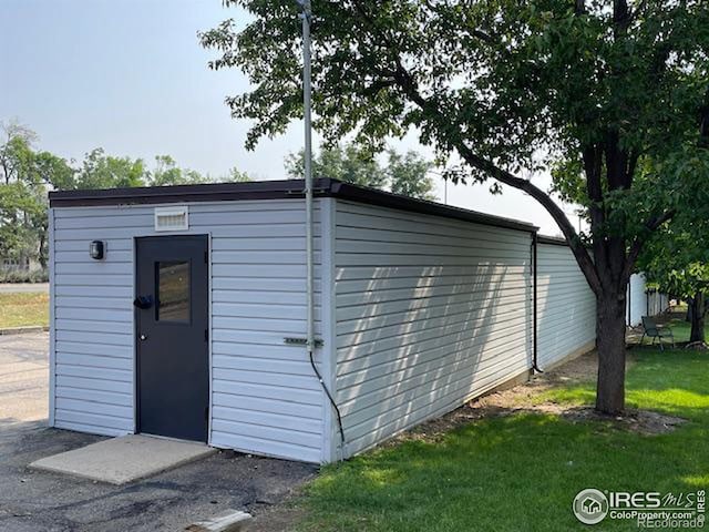 view of outbuilding with an outdoor structure