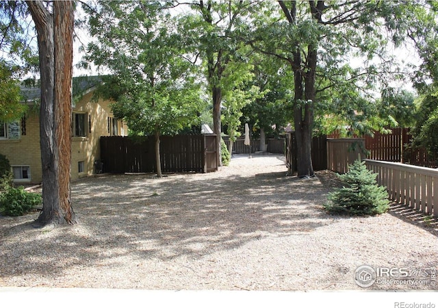 view of yard with fence