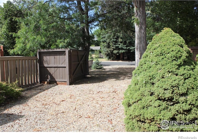 exterior space featuring a storage shed