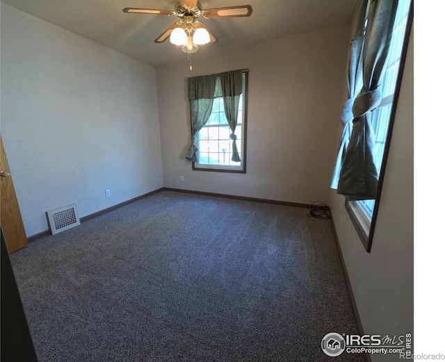 619 Curtis St, Brush, CO 80723 - empty room featuring carpet flooring and ceiling fan