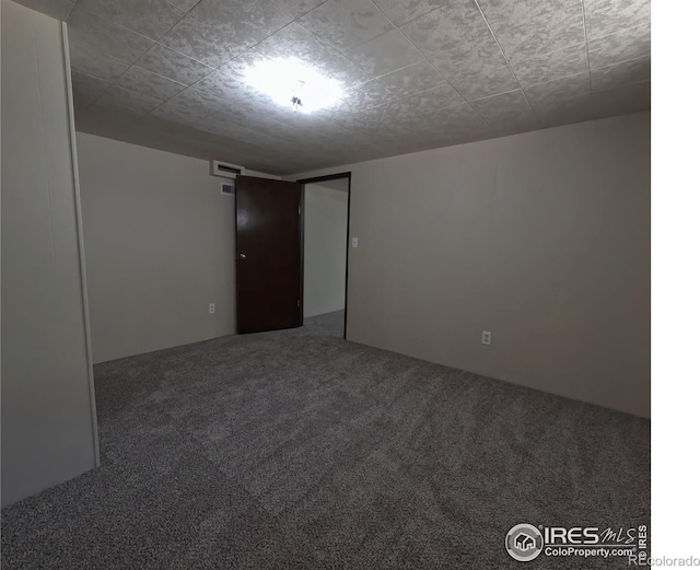 619 Curtis St, Brush, CO 80723 - spare room featuring carpet floors