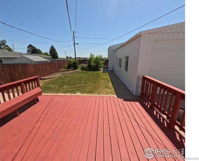 619 Curtis St, Brush, CO 80723 - wooden deck featuring a fenced backyard