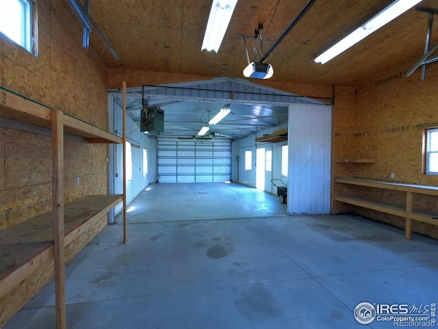 619 Curtis St, Brush, CO 80723 - garage featuring a garage door opener