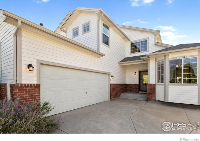 view of front of property featuring a garage