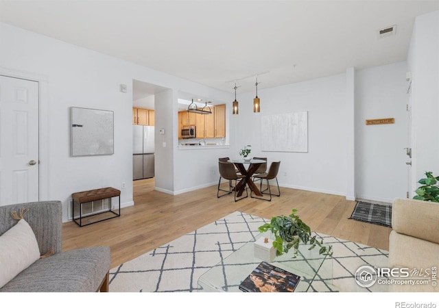 living room with light wood-type flooring