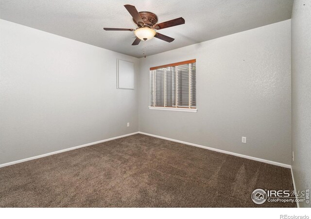 carpeted empty room with ceiling fan