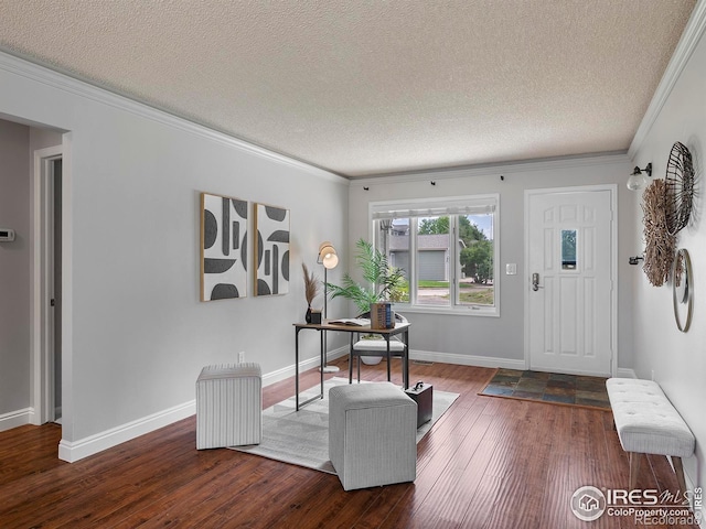 entryway featuring ornamental molding, a textured ceiling, and dark hardwood / wood-style flooring