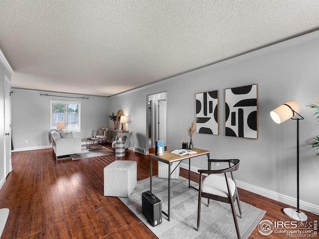 office area featuring dark hardwood / wood-style flooring, crown molding, and a textured ceiling