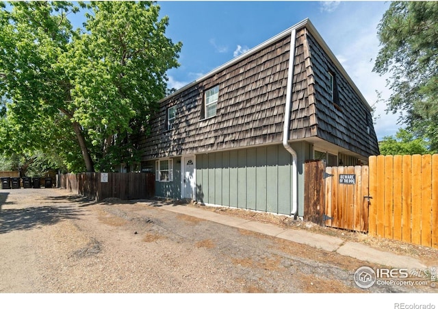 3300 Madison Ave, Boulder, CO 80303 - view of front of house featuring fence and mansard roof