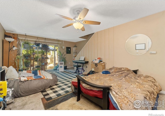 3300 Madison Ave, Boulder, CO 80303 - bedroom with ceiling fan, carpet, and a textured ceiling