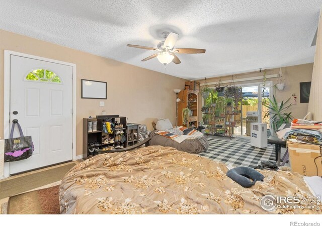 3300 Madison Ave, Boulder, CO 80303 - bedroom featuring carpet flooring, access to exterior, ceiling fan, and a textured ceiling
