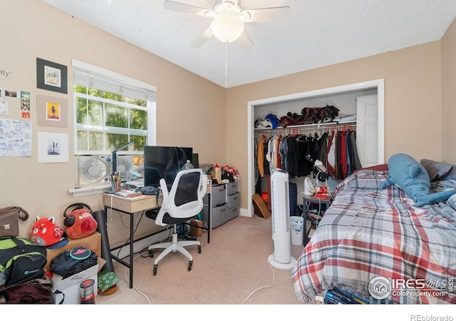 3300 Madison Ave, Boulder, CO 80303 - carpeted bedroom with a closet, ceiling fan, and a textured ceiling