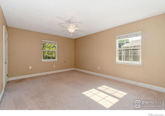 3300 Madison Ave, Boulder, CO 80303 - unfurnished room with carpet floors, baseboards, and ceiling fan