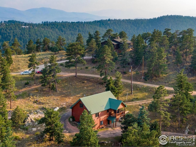 679 Mount Massive Dr, Livermore, CO 80536 - aerial view with a view of trees and a mountain view