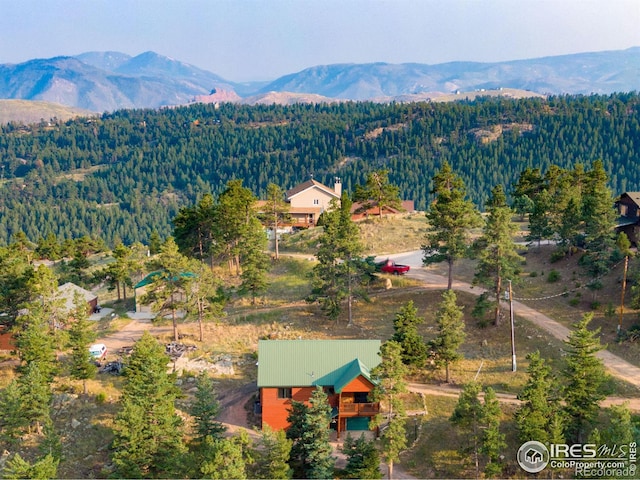 679 Mount Massive Dr, Livermore, CO 80536 - birds eye view of property featuring a mountain view and a wooded view