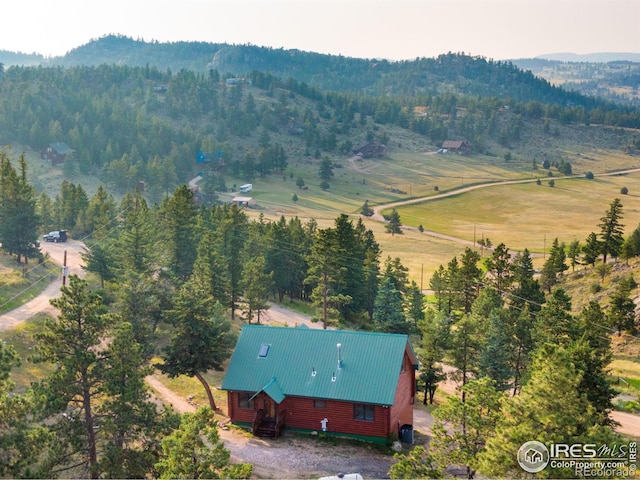 679 Mount Massive Dr, Livermore, CO 80536 - birds eye view of property with a rural view, a wooded view, and a mountain view
