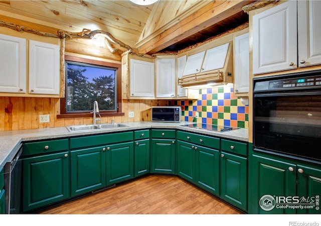 kitchen with black appliances, light hardwood / wood-style flooring, and white cabinetry