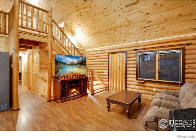 living room with wooden ceiling, log walls, high vaulted ceiling, and hardwood / wood-style floors