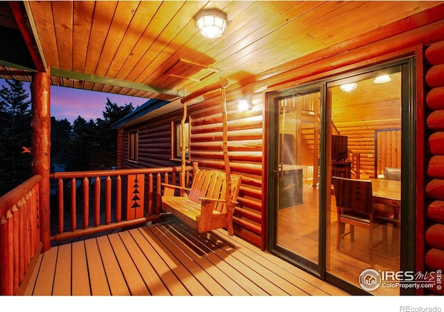 679 Mount Massive Dr, Livermore, CO 80536 - view of deck at dusk