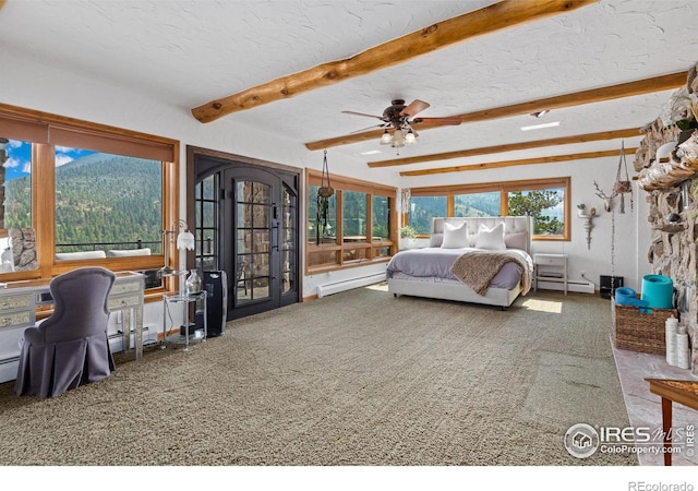 bedroom featuring carpet floors, beam ceiling, a baseboard heating unit, and a textured ceiling