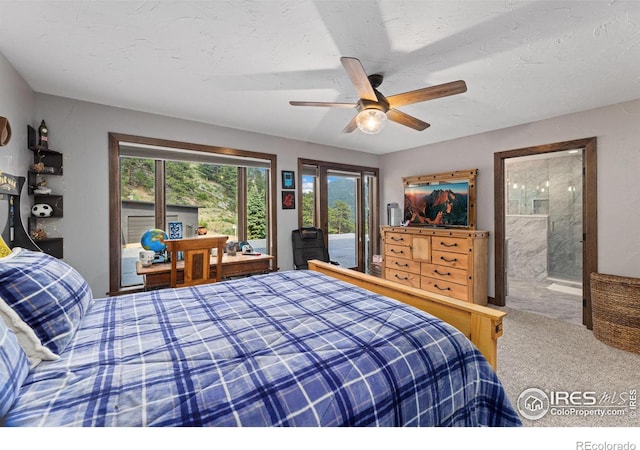 bedroom featuring carpet floors, a ceiling fan, connected bathroom, a textured ceiling, and access to outside