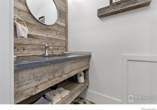 bathroom with sink and tile patterned floors