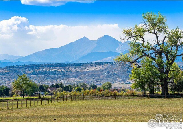 view of mountain feature with a rural view