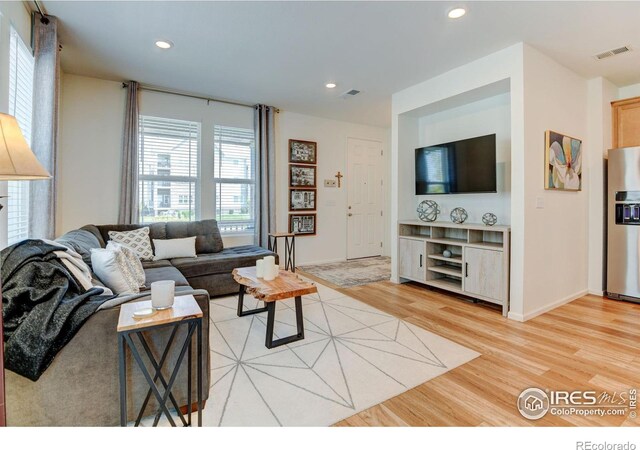 living room featuring light hardwood / wood-style floors