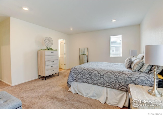 bedroom featuring light colored carpet