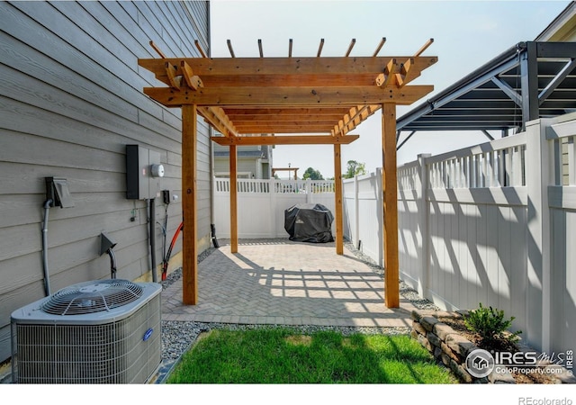 exterior space with a pergola, central AC, and a patio area