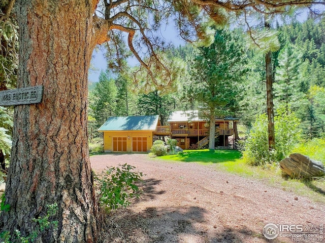 view of front of house featuring a wooden deck