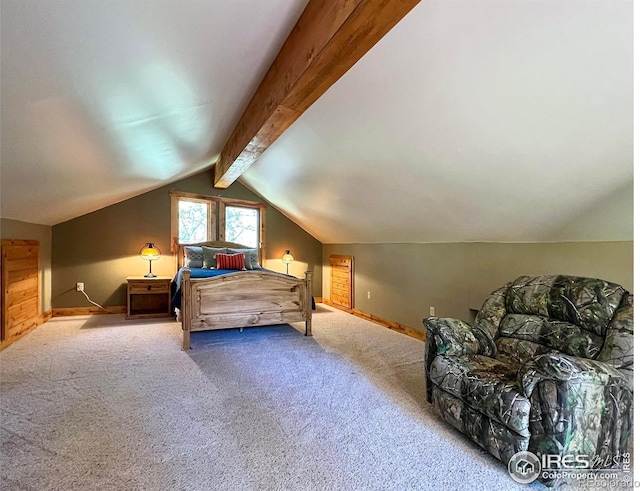 carpeted bedroom with lofted ceiling with beams