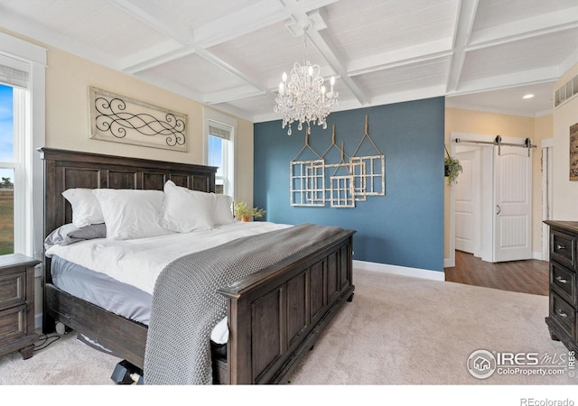 bedroom featuring a barn door, beam ceiling, hardwood / wood-style flooring, a notable chandelier, and coffered ceiling