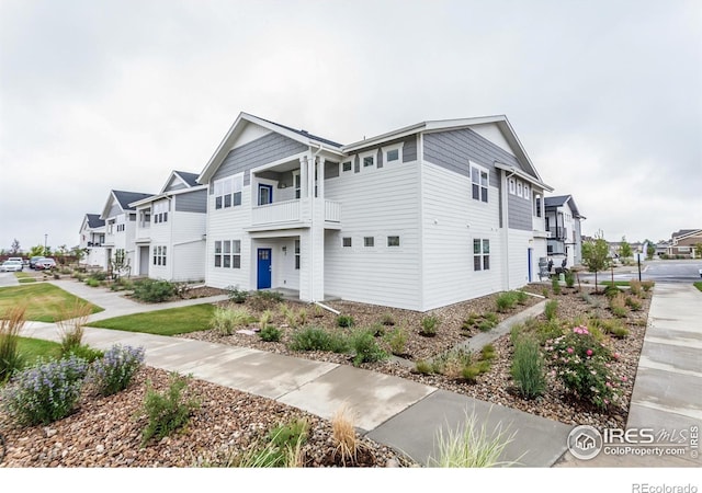 townhome / multi-family property featuring a balcony