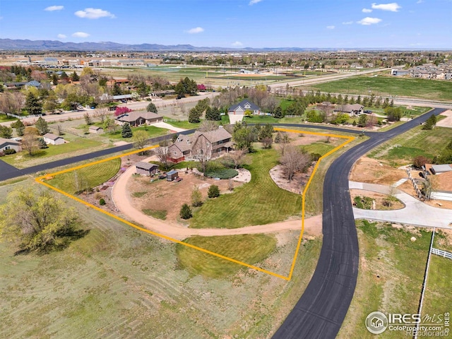 bird's eye view with a mountain view