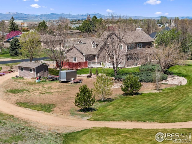 drone / aerial view featuring a mountain view