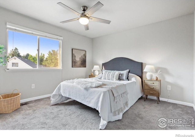 carpeted bedroom featuring ceiling fan