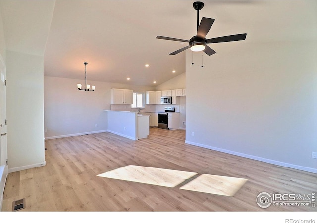 unfurnished living room with lofted ceiling, light hardwood / wood-style floors, and ceiling fan with notable chandelier