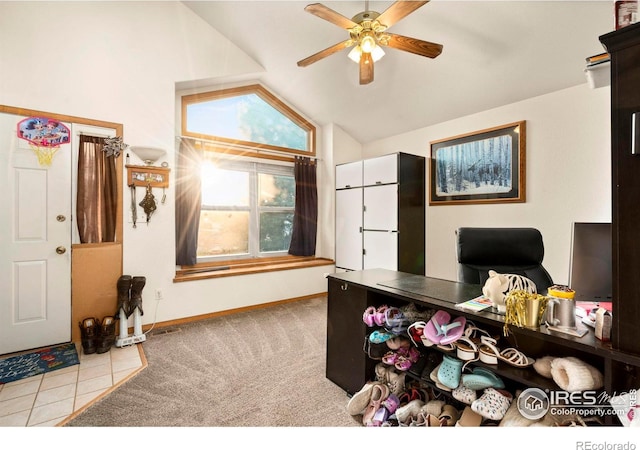 home office with light carpet, lofted ceiling, and ceiling fan