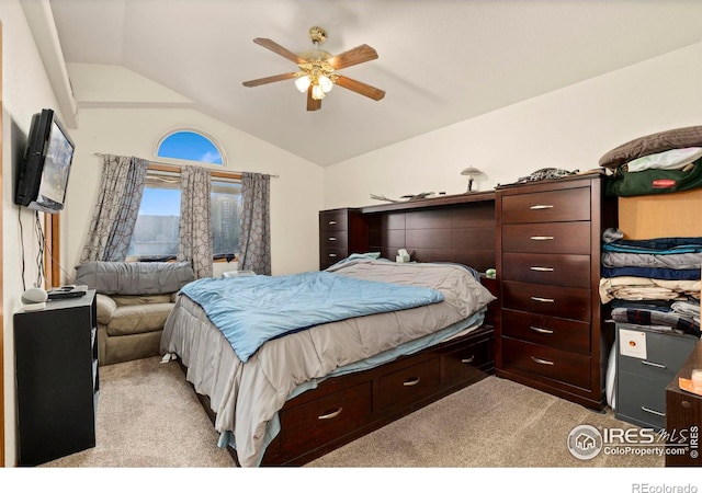 bedroom with light carpet, lofted ceiling, and ceiling fan