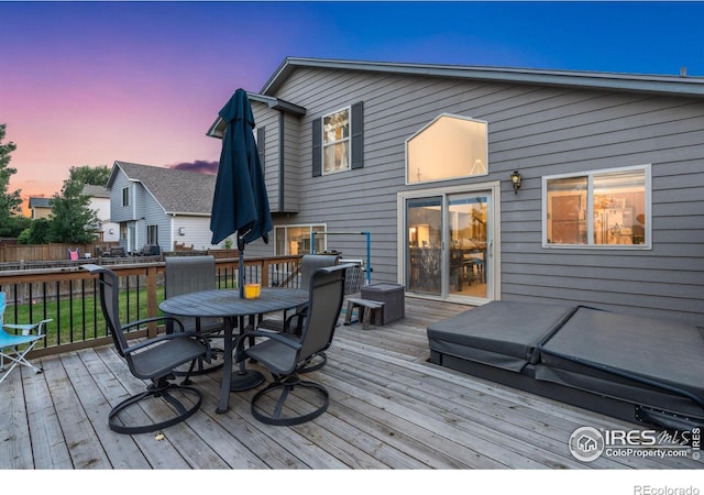 view of deck at dusk