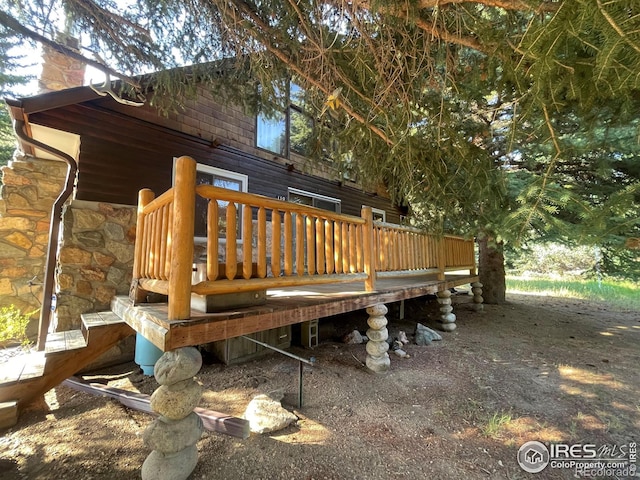 rear view of property with a deck