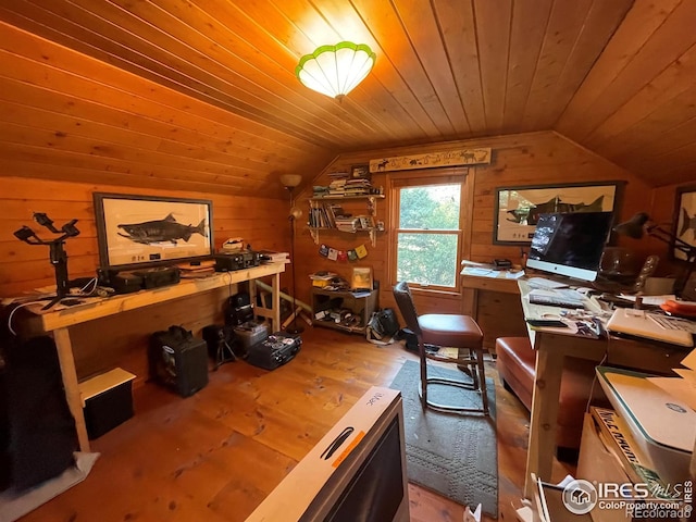 home office with wood walls, wooden ceiling, and lofted ceiling