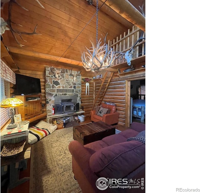 living room with lofted ceiling, a chandelier, wood ceiling, log walls, and a stone fireplace