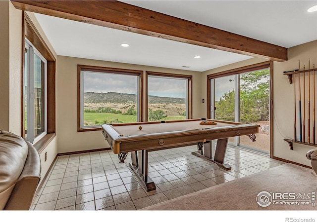 rec room with beam ceiling, light tile patterned floors, and billiards