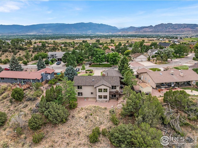 drone / aerial view with a mountain view